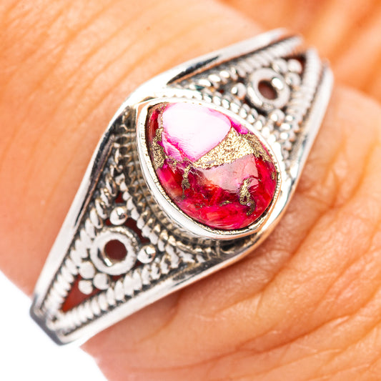 Oval cabochon gemstone ring with ornate .925 sterling silver filigree, pink and red stone