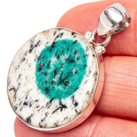 Oval turquoise azurite pendant in sterling silver bezel, with hinged bail and loop.