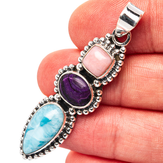 Sterling silver pendant with pink opal, purple sugilite, and blue larimar stones