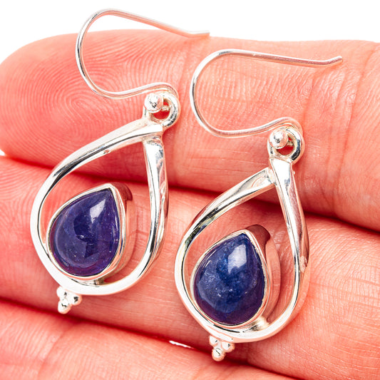 Sterling silver teardrop earrings with blue tanzanite gemstones, hooked backs