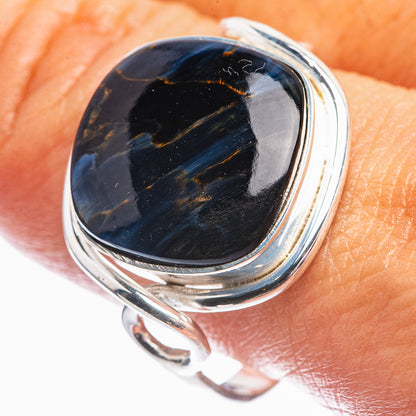 Sterling silver oval stone ring with dark blue pietersite cabochon and looped side bail