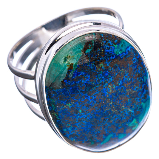 Sterling silver bezel ring with blue-green oval gemstone and wide band