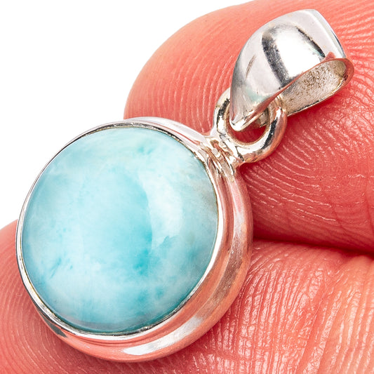 Sterling silver larimar pendant with round light-blue cabochon bezel and hinged bail