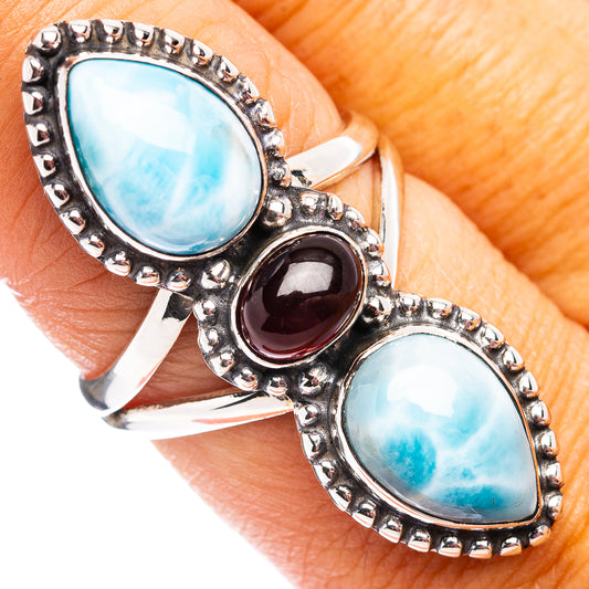 Size 8 .925 sterling silver ring with blue teardrop larimar and red garnet oval stones