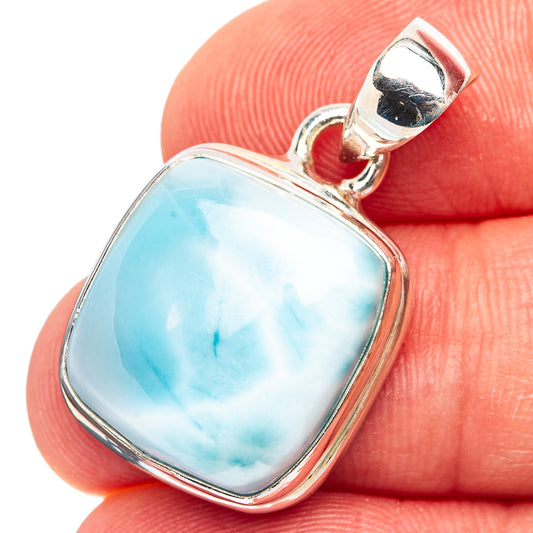Sterling silver pendant with blue Larimar cabochon bezel and top loop bail