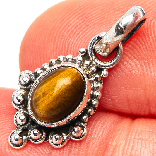 925 sterling silver tiger's eye pendant with round amber stone, ornate beaded setting