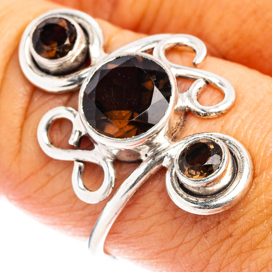 Smoky quartz .925 sterling silver ring, oval center bezel with two smaller round bezels