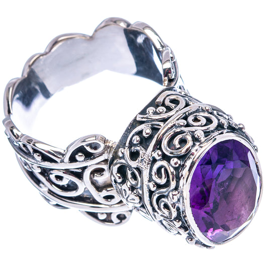 Sterling silver filigree ring featuring a faceted oval purple amethyst side-set stone