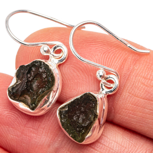 Sterling silver dangle earrings with dark raw stone in bezel, fishhook backs