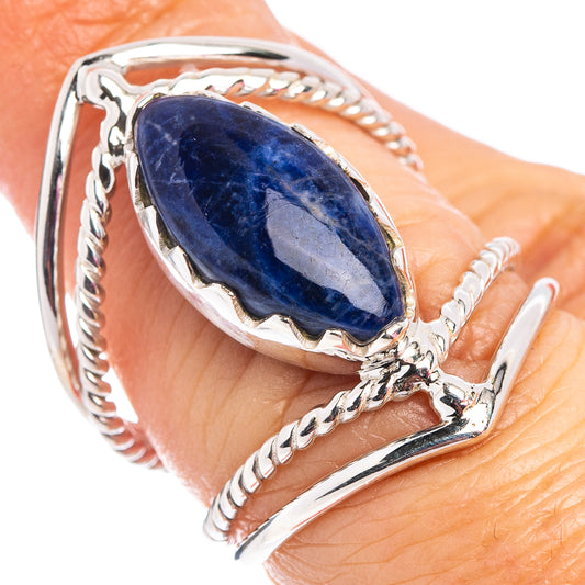 Sodalite oval gemstone ring on finger, .925 sterling silver rope bezel and openwork band