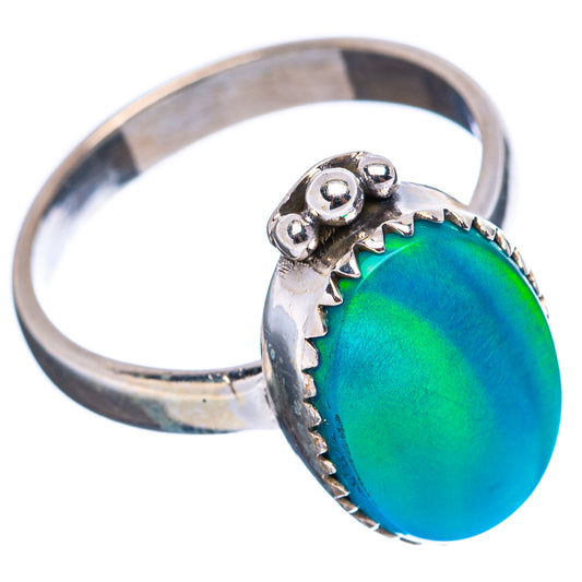 Green oval opal-style cabochon sterling silver ring with scalloped halo, size 7.75
