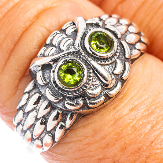 Sterling silver owl dainty ring with two green peridot cabochons