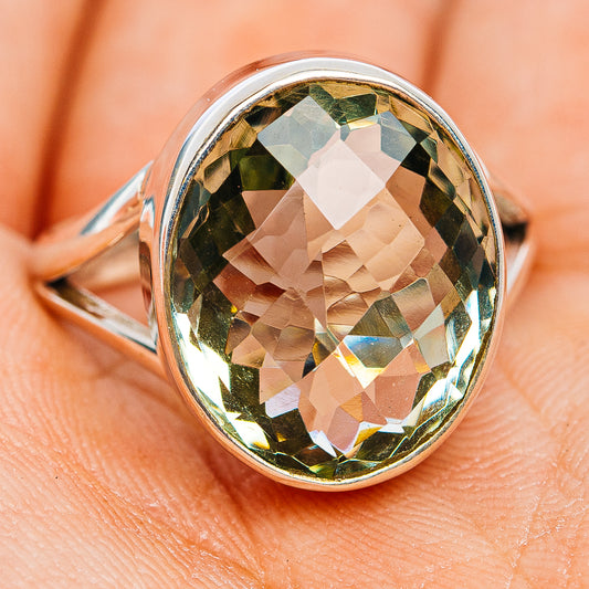 Sterling silver ring with large oval green faceted amethyst stone, bezel setting