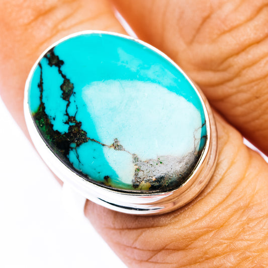 Sterling silver ring with oval turquoise cabochon and black matrix veins