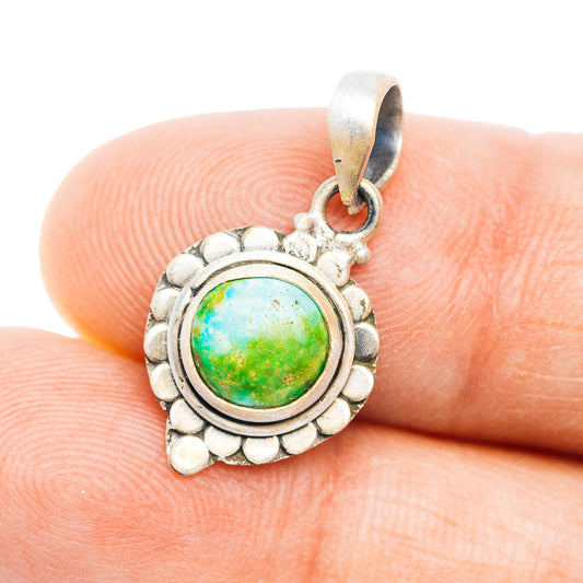 Sterling silver pendant with round bezel turquoise cabochon, silver bail loop