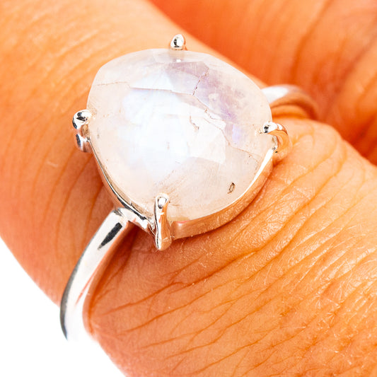 Sterling silver moonstone ring with large oval faceted gemstone, open prong setting.