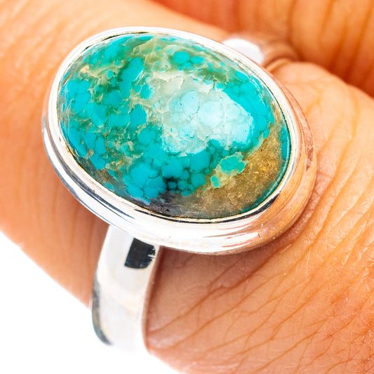 Sterling silver band ring with turquoise oval stone, size 8