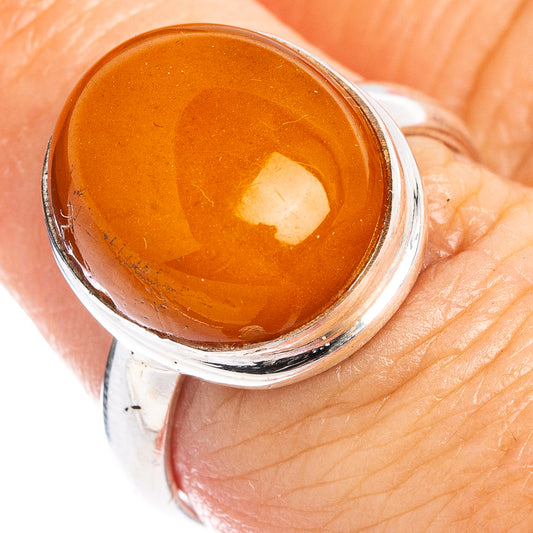 Amber orange cabochon sterling silver ring, size 7.75, oval top setting
