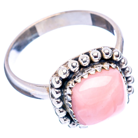 Pink opal sterling silver ring with ball-stud band and round pink gemstone bezel.