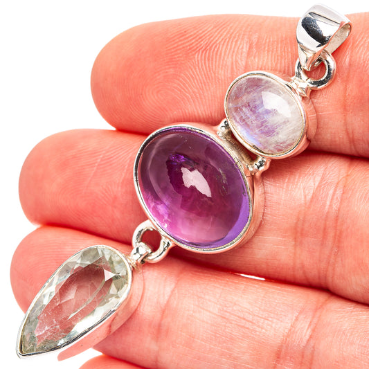 Oval amethyst and moonstone pendant in .925 sterling silver with two gemstone bezels