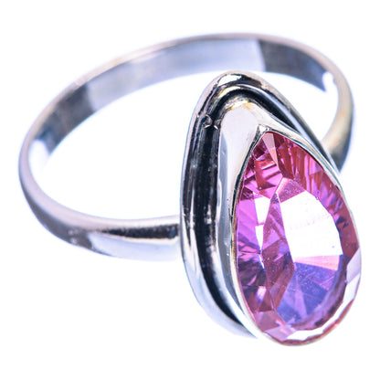Sterling silver oval faceted color-change ring with pink-purple gemstone, curved bezel