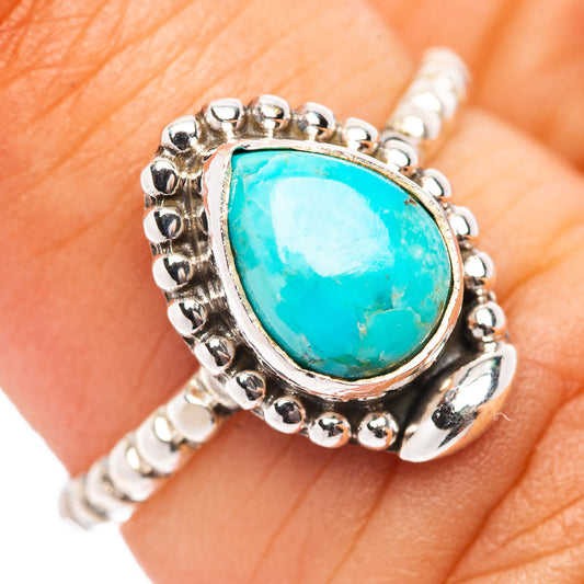 Sterling silver turquoise ring with oval Mojave turquoise cabochon and beaded band