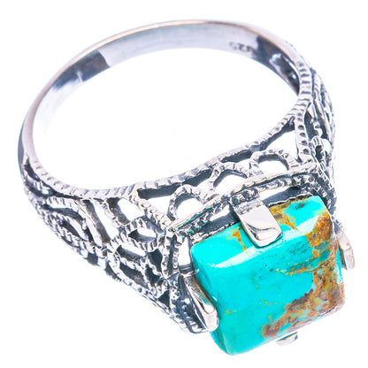 Turquoise stone silver ring with textured band and square bezel setting