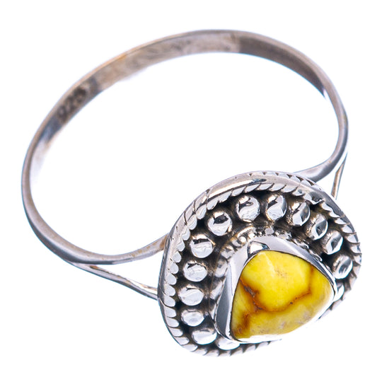 Dainty sterling silver ring with oval yellow turquoise stone