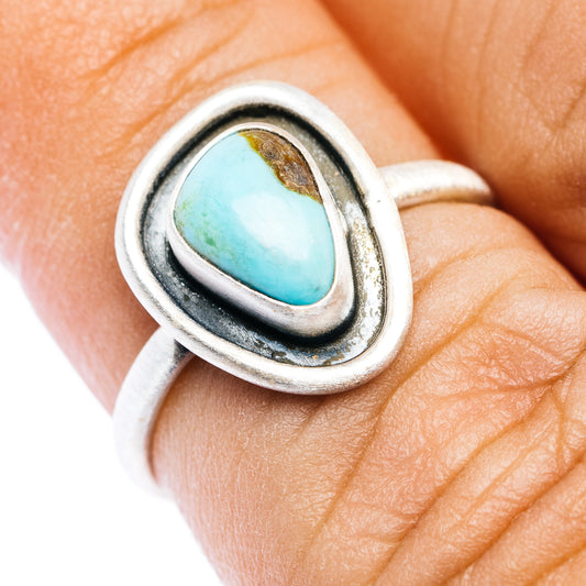 Oval turquoise gemstone sterling silver ring with double bezel detail
