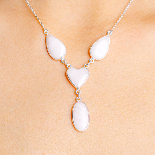 Sterling silver heart necklace with pink opal heart charms and linked chain