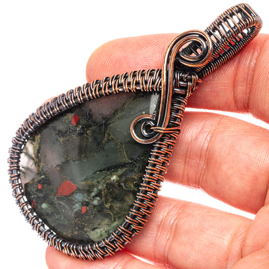 Oxidized copper wire-wrapped bloodstone teardrop pendant, looped bail