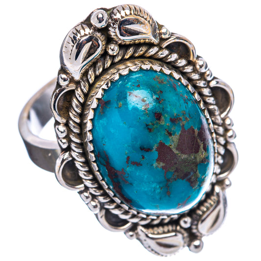 Sterling silver turquoise oval cabochon ring with detailed scroll setting