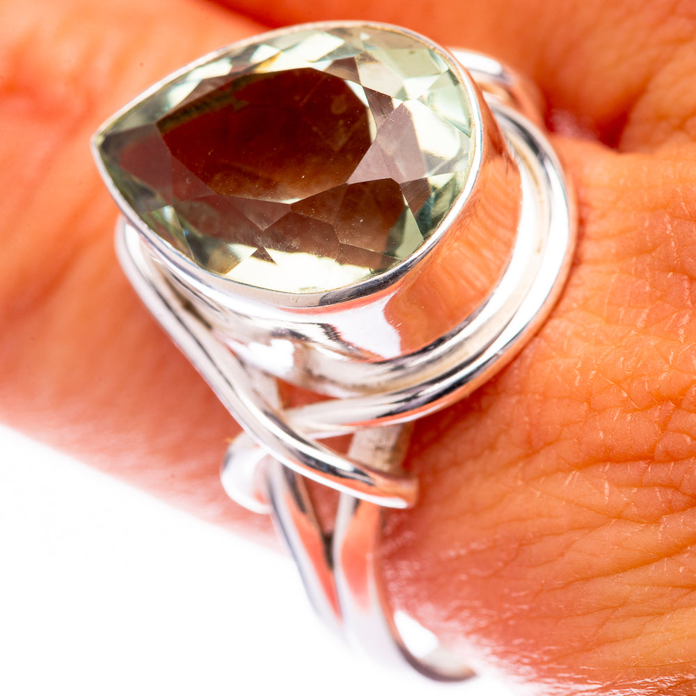 Sterling silver ring with faceted oval green amethyst, size 11.75.