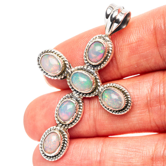 Sterling silver opal cross pendant with five oval iridescent Ethiopian opals