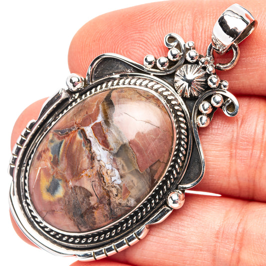 Sterling silver butterfly jasper pendant with oval picture jasper cabochon and bail