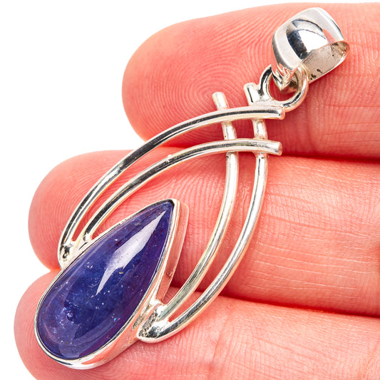 Sterling silver blue tanzanite teardrop pendant, side view with bail and prongs