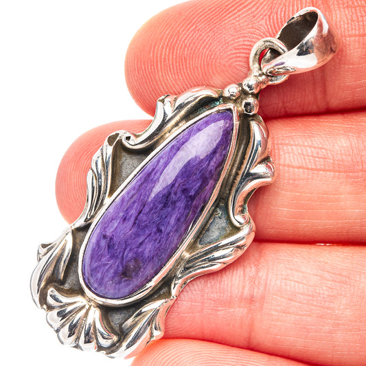 Premium charoite pendant in 925 sterling silver with oval purple cabochon bezel