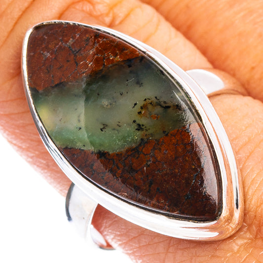 Sterling silver ring with teardrop chrysoprase cabochon in bezel, green center with brown