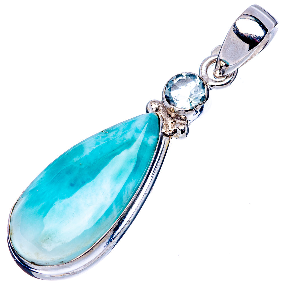 Blue gemstone teardrop pendant with sky-blue round stones in silver setting.