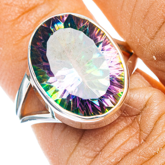 Sterling silver oval ring with iridescent faceted stone, size 6.75