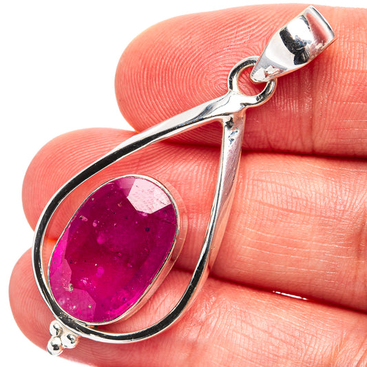 Sterling silver teardrop pendant with oval pink ruby gemstone