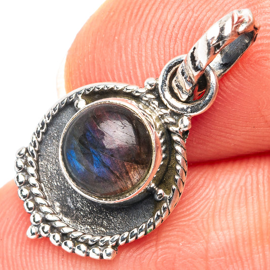 Round labradorite pendant in .925 sterling silver with blue flash and textured bezel