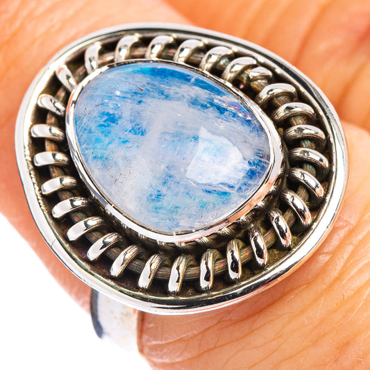 Oval blue moonstone ring with .925 sterling silver bezel and twisted band