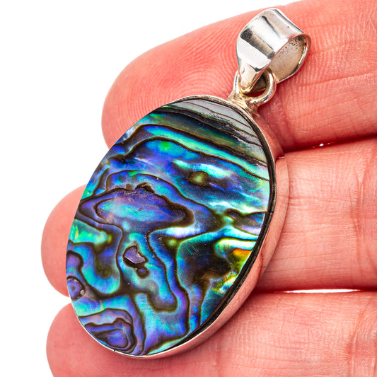 Abalone shell teardrop pendant in .925 sterling silver with iridescent blue-green sheen