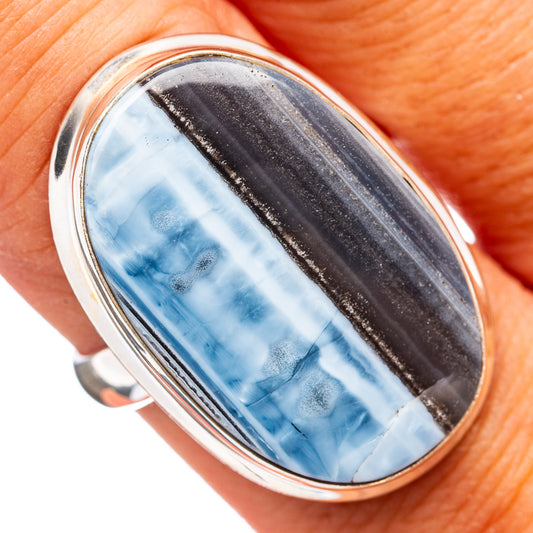 Oval opal ring in sterling silver with blue, black, and streaked cabochon
