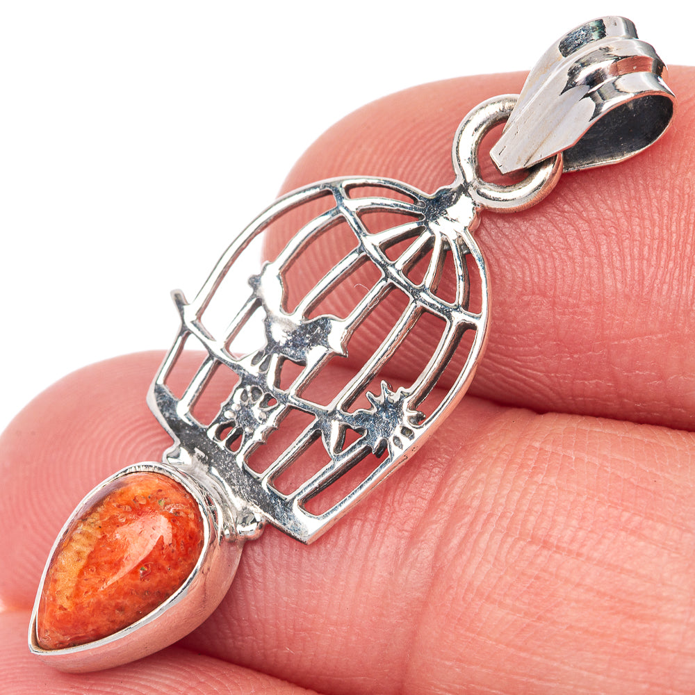 925 sterling silver coral pendant with orange teardrop stone and bird cage design