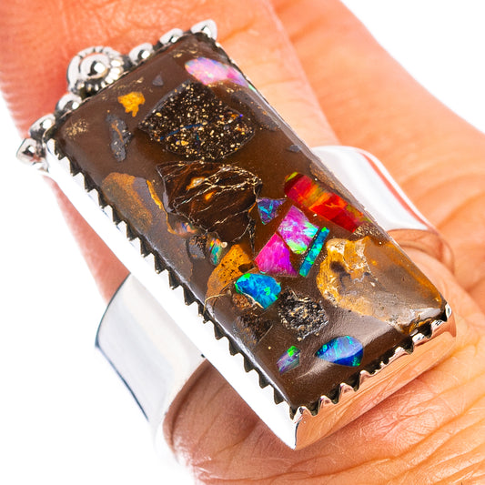 Sterling silver ring with dark boulder opal matrix centerpiece and colorful inlays