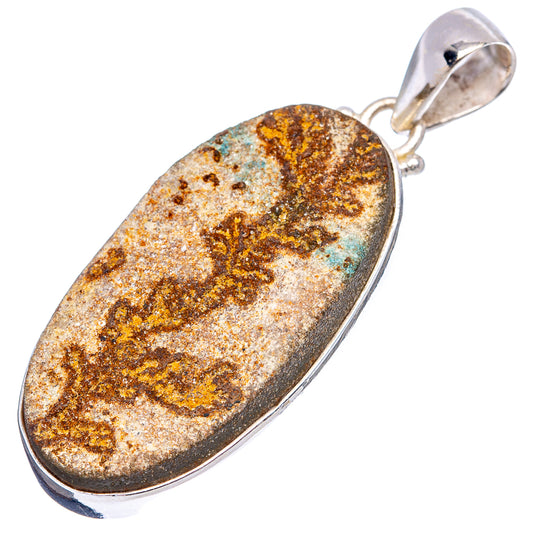 Sterling silver oval pendant with psilomelane dendrite stone, gold-brown mottled pattern.