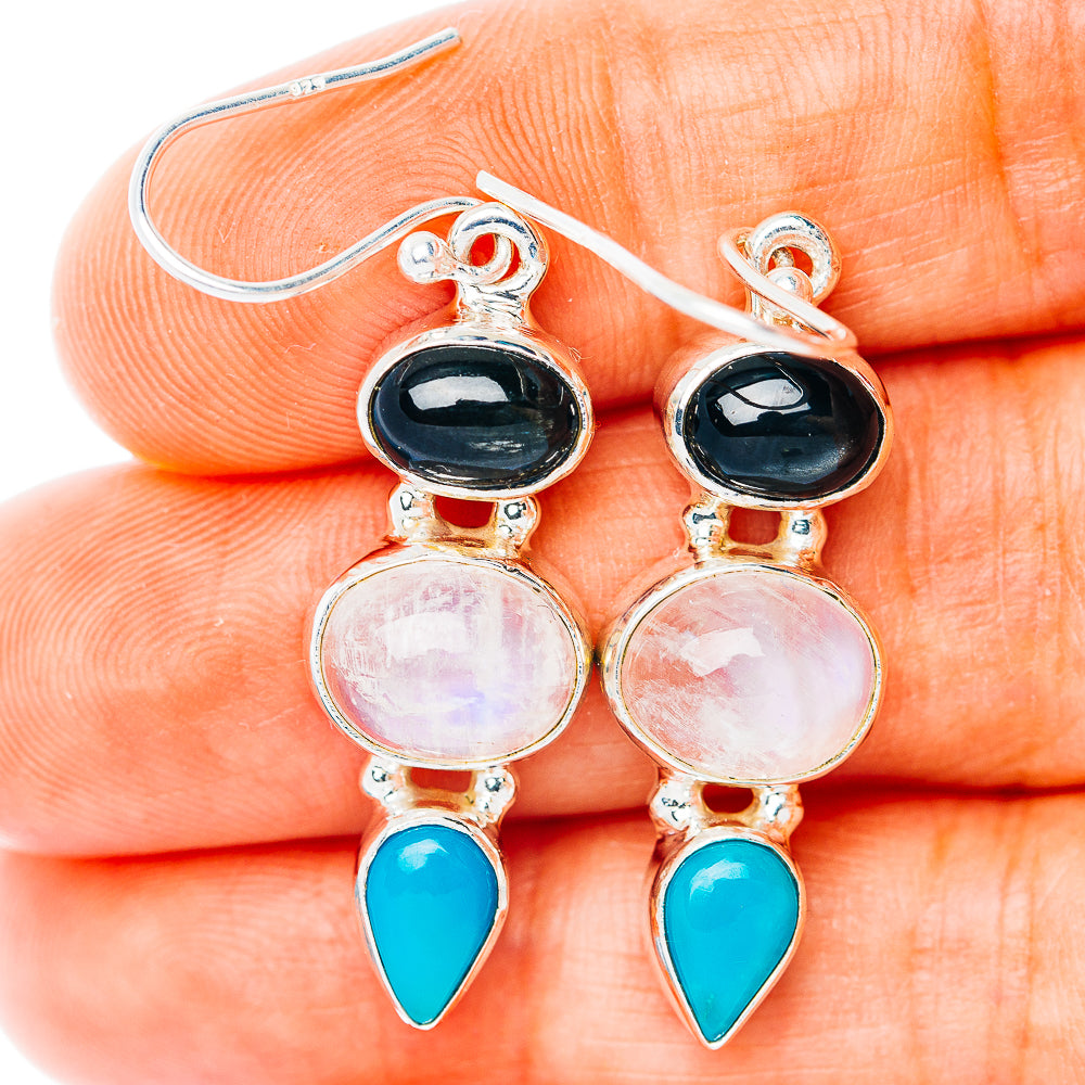 Sterling silver drop earrings with black, iridescent moonstone, and turquoise stones