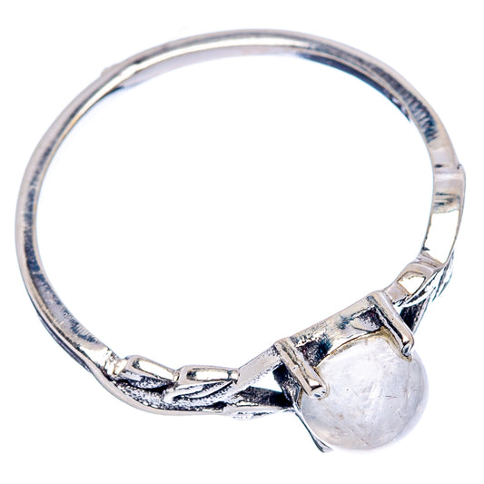 Sterling silver ring band with oval moonstone bezel and textured knot detail